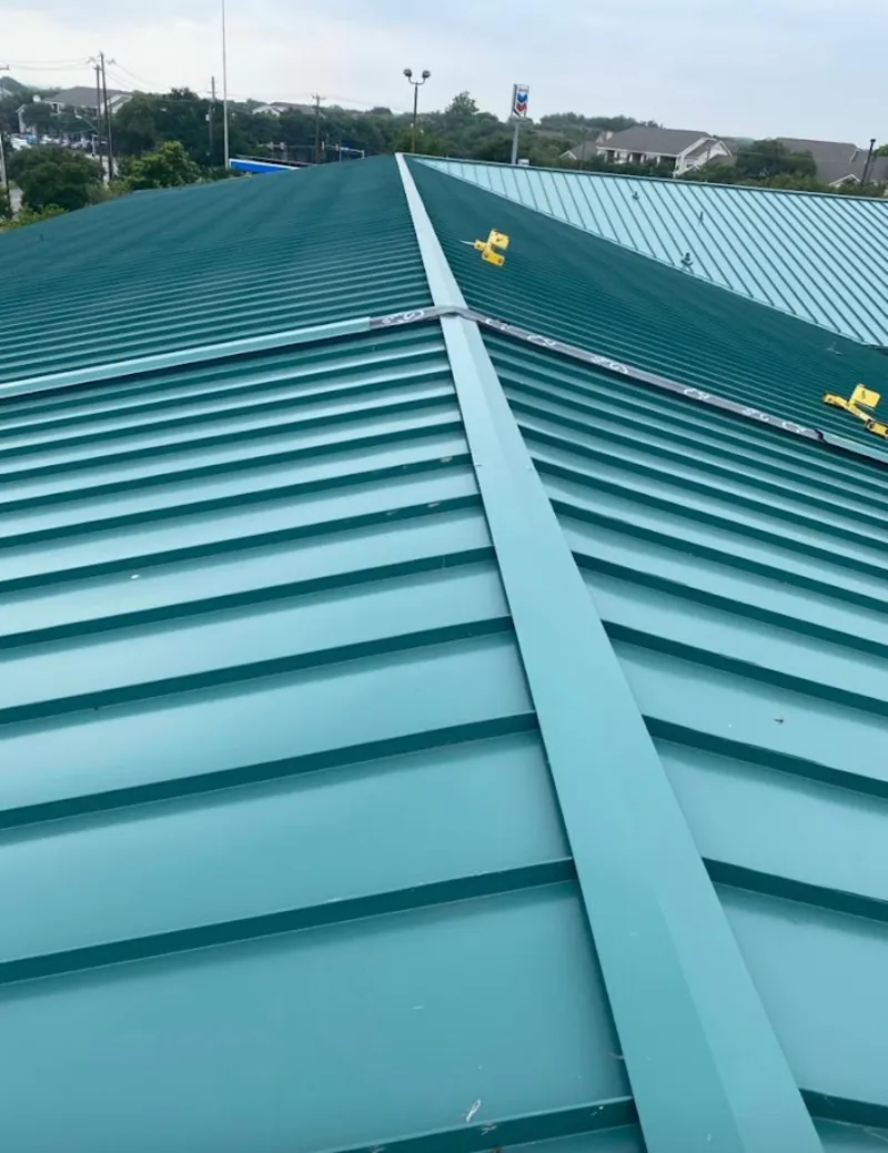 Green commercial metal roof ridge and valley for Metal Roof Repair in Perry